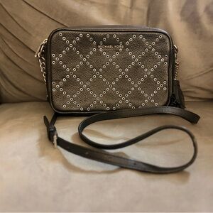 Michael Kors Black Leather Crossbody with silver Eyelet/ grommet Diamond pattern